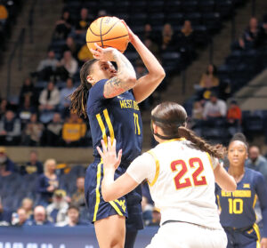 No. 20 WVU limits Audi Crooks to 13 points, rolls past Iowa State